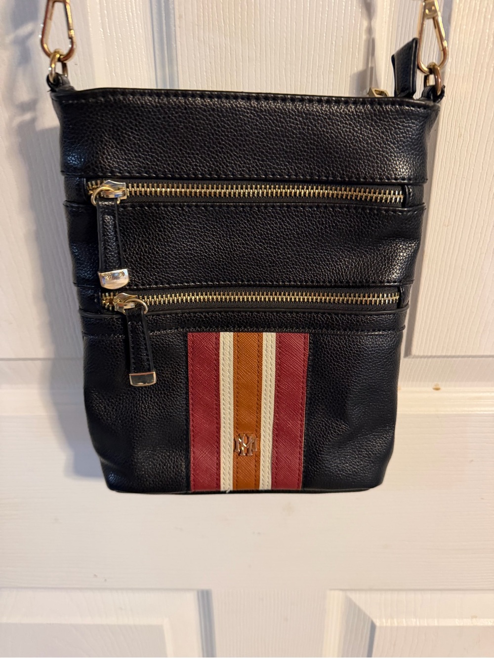 Black Crossbody Bag with Red and Tan Stripe Accent by